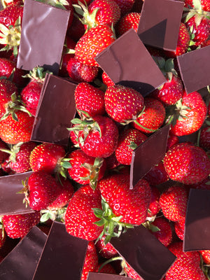 an assortment of fresh strawberries and Tangle Chocolate thins